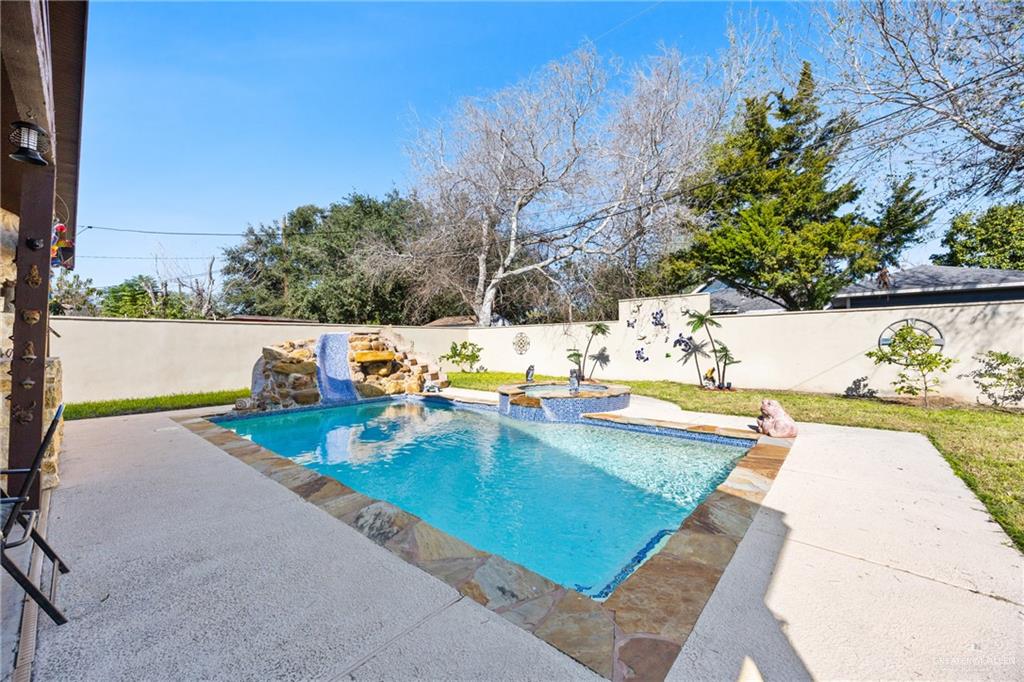 1811 Victoria Street Mission, TX 78572 - Photo 19 of 19 a view of a swimming pool with a patio