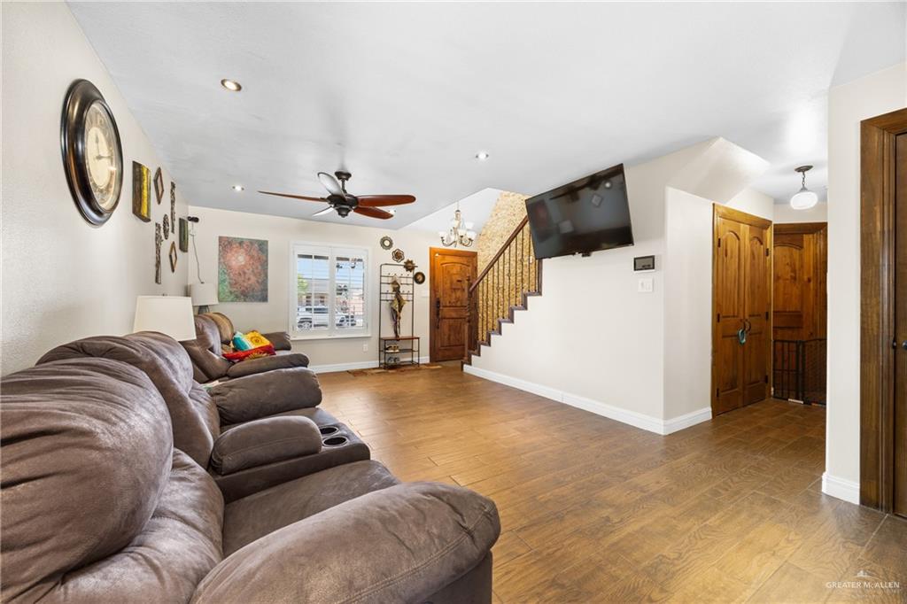 1811 Victoria Street Mission, TX 78572 - Photo 2 of 19 a living room with furniture and a white wall