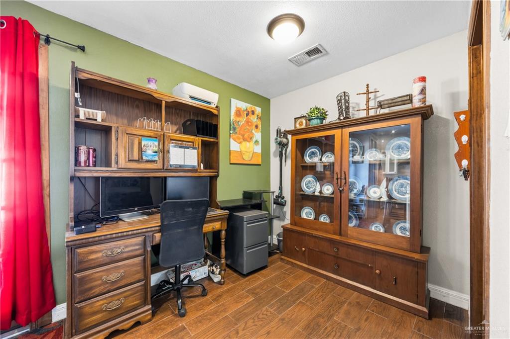 1811 Victoria Street Mission, TX 78572 - Photo 8 of 19 a view of workspace with windows