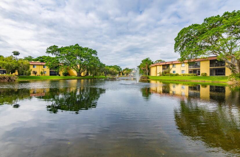 906 Southwest 9th St Circle, Unit 204 Boca Raton, FL 33486 - Photo 30 of 39 a view of a lake with houses