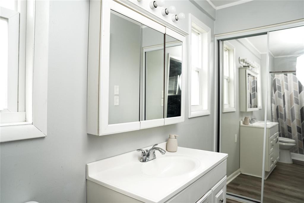 821 Barber Street Sebastian, FL 32958 - Photo 14 of 29 a bathroom with a sink and a mirror