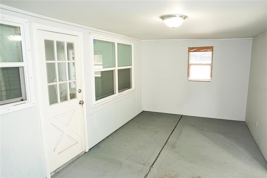 821 Barber Street Sebastian, FL 32958 - Photo 22 of 29 an empty room with windows