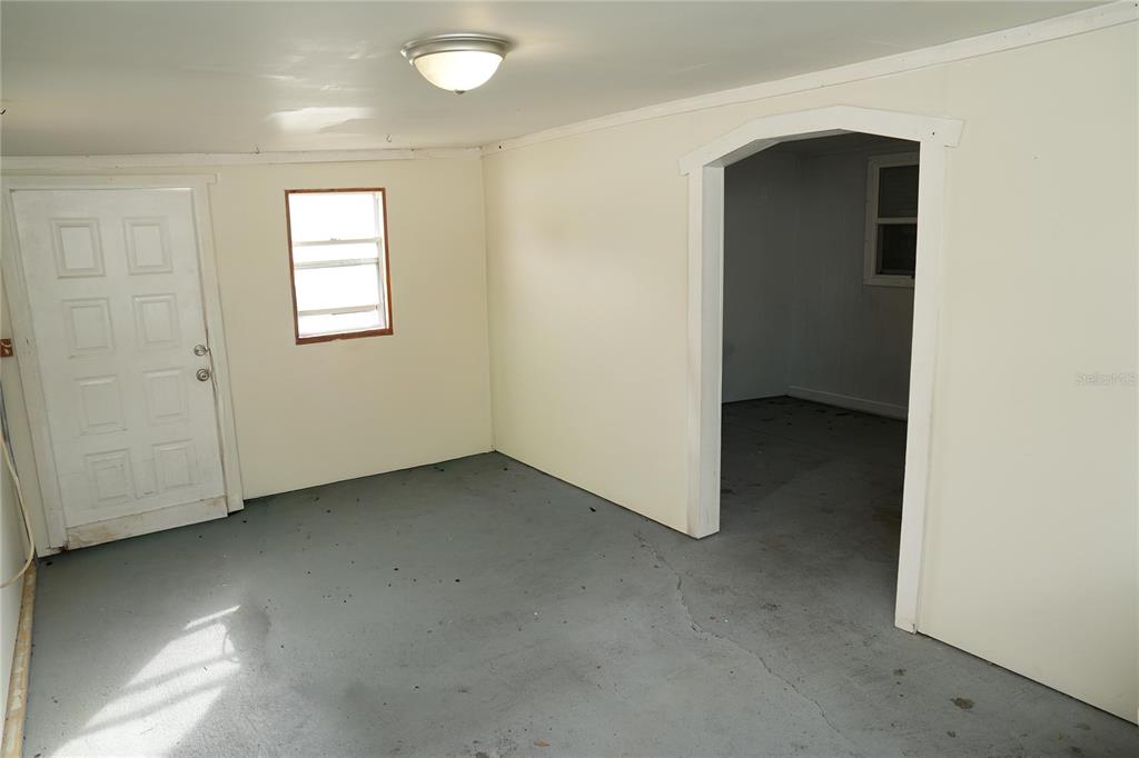 821 Barber Street Sebastian, FL 32958 - Photo 23 of 29 an empty room with windows