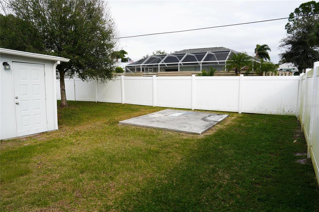 821 Barber Street Sebastian, FL 32958 - Photo 24 of 29 a view of a backyard with potted plants