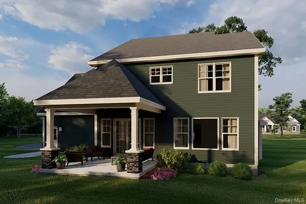 front view of a house with a yard