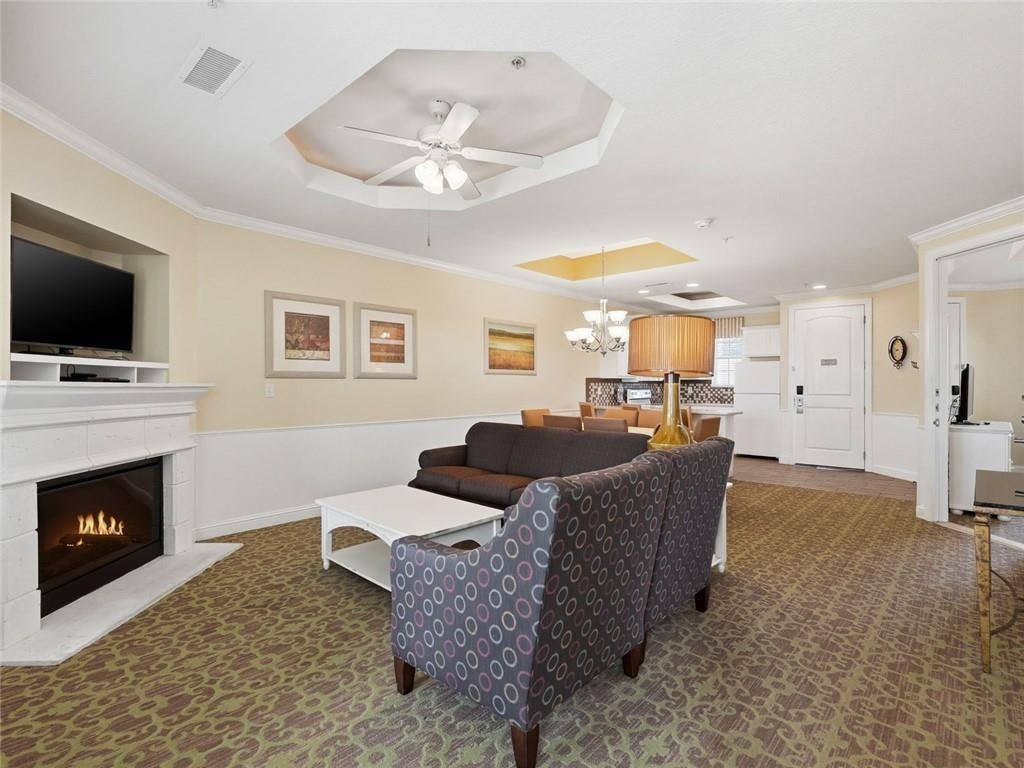 150 Apple Seed Court, Unit 131 Clarkesville, GA 30523 - Photo 7 of 40 a living room with furniture and a flat screen tv