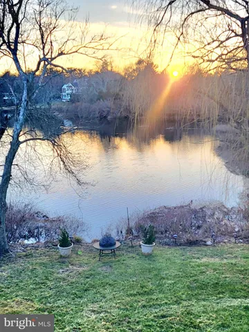 a sunset view with lake view