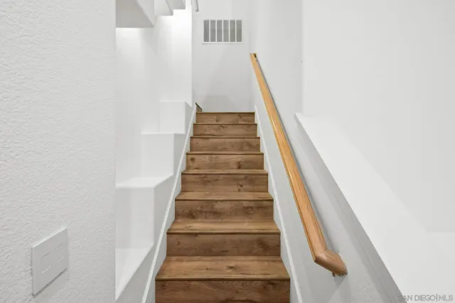 a view of a car parked in front of a building