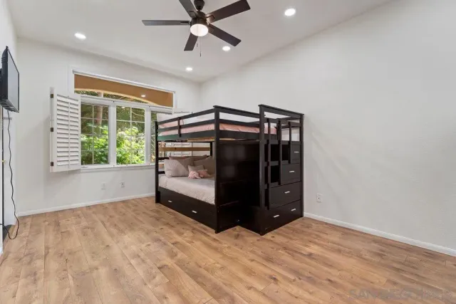 a view of a gate with a wrought fence