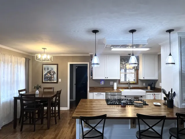 a view of a dining room with furniture