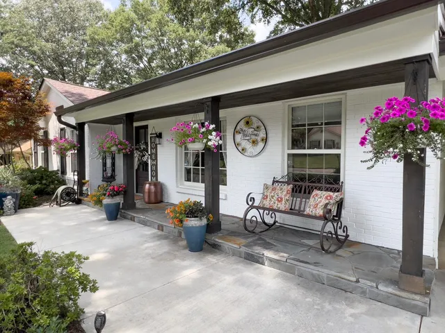 a view of a chairs and tables in patio