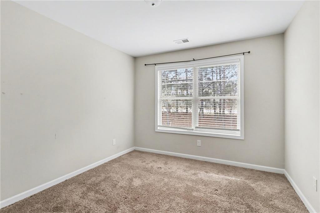 3352 Mt Zion Road Stockbridge, GA 30281 - Photo 12 of 22 a view of an empty room with a window
