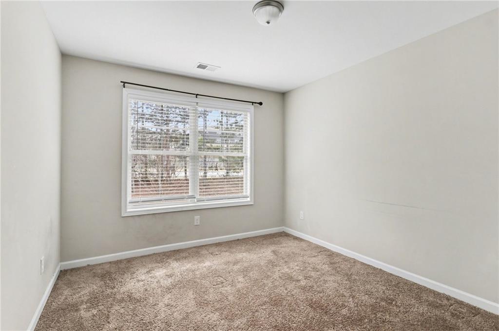 3352 Mt Zion Road Stockbridge, GA 30281 - Photo 14 of 22 an empty room with a window