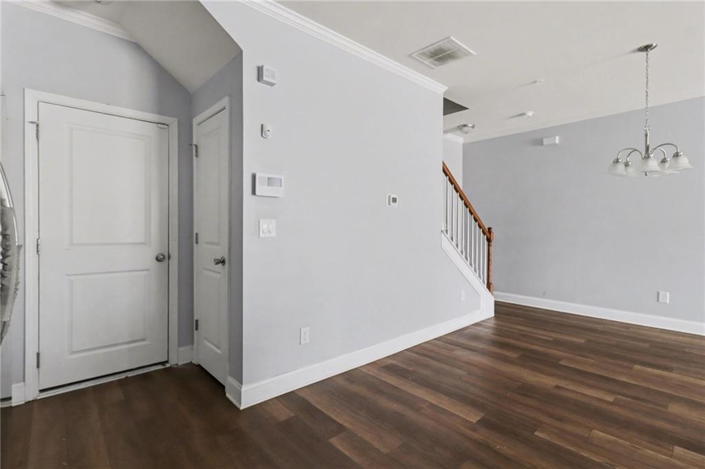 3352 Mt Zion Road Stockbridge, GA 30281 - Photo 15 of 22 a view of a hallway with wooden floor and entryway