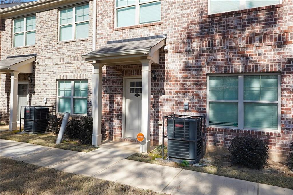 3352 Mt Zion Road Stockbridge, GA 30281 - Photo 5 of 22 a front view of a house with a yard