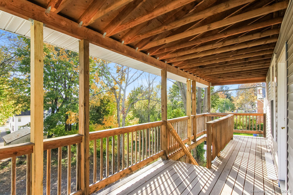 66 Winthrop Street, Unit 3 New Britain, CT 06052 - Photo 3 of 7 a view of a balcony with wooden floor