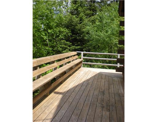 34 Porcupine Trail Stratton, ME 04982 - Photo 20 of 21 Patio/Deck. Wrap around Deck with Seats