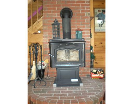 34 Porcupine Trail Stratton, ME 04982 - Photo 3 of 21 Living Room. Wood Stove