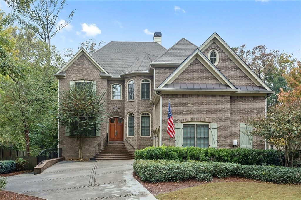 1428 Oak Grove Drive Decatur, GA 30033 - Photo 1 of 1 Gorgeous custom home with professional landscaping, plenty of parking and three car garage.