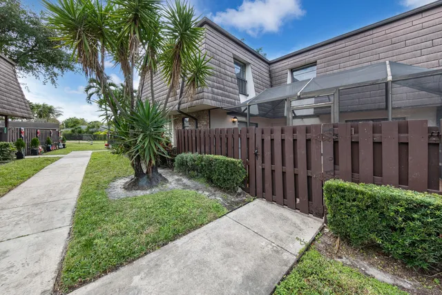 a view of a backyard with a garden