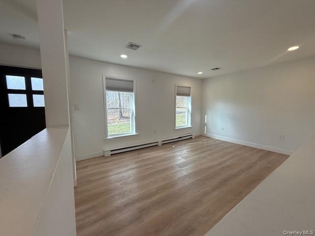 50 Continental Road Warwick, NY 10990 - Photo 26 of 46 an empty room with wooden floor and windows