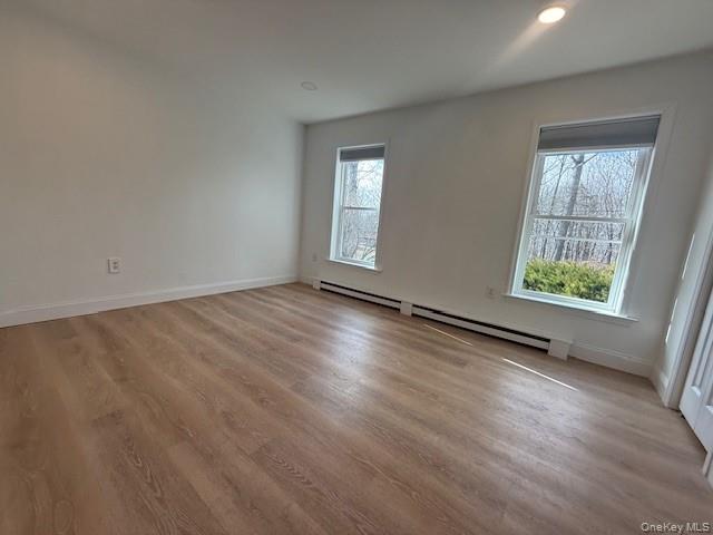 50 Continental Road Warwick, NY 10990 - Photo 32 of 46 an empty room with wooden floor and windows