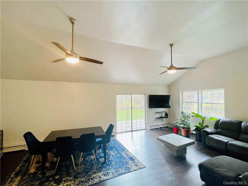 50 Continental Road Warwick, NY 10990 - Photo 5 of 46 a living room with furniture and a flat screen tv