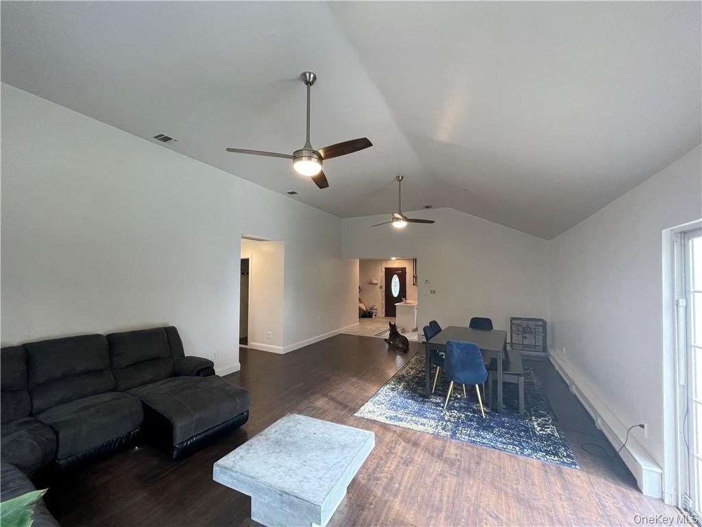 50 Continental Road Warwick, NY 10990 - Photo 8 of 46 a living room with furniture and a chandelier