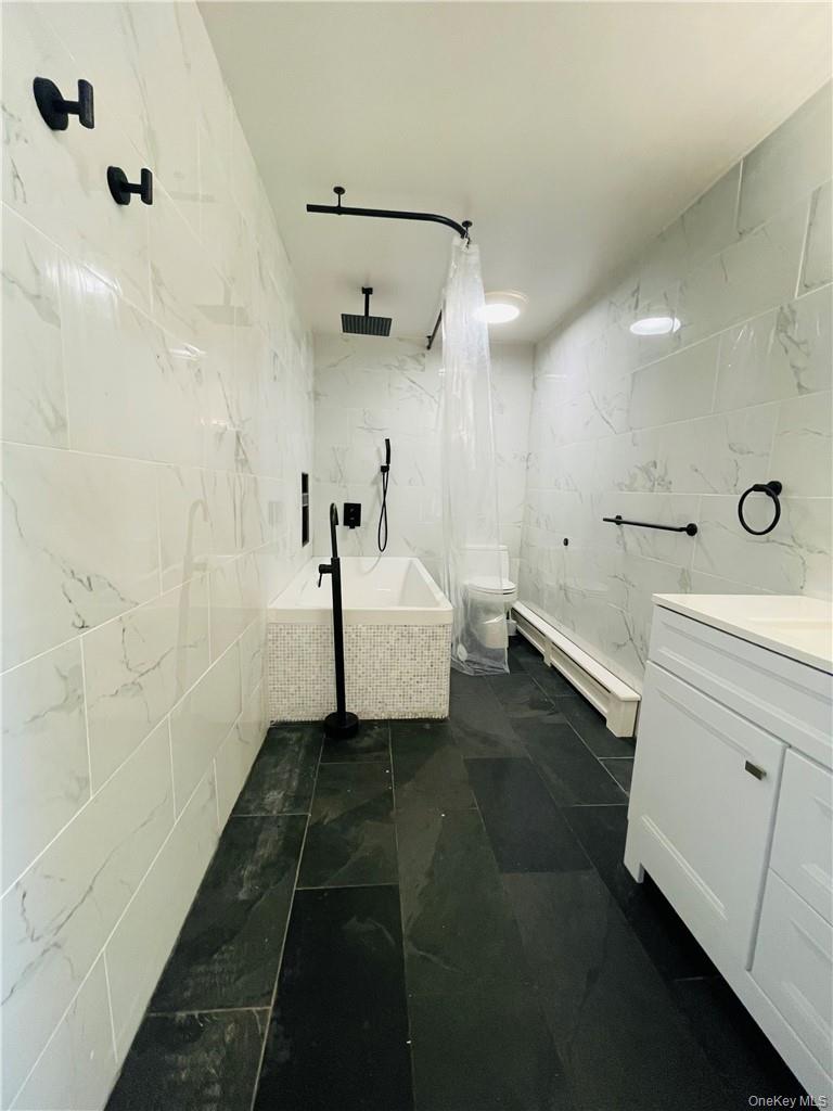 50 Continental Road Warwick, NY 10990 - Photo 9 of 46 a bathroom with a sink and mirror