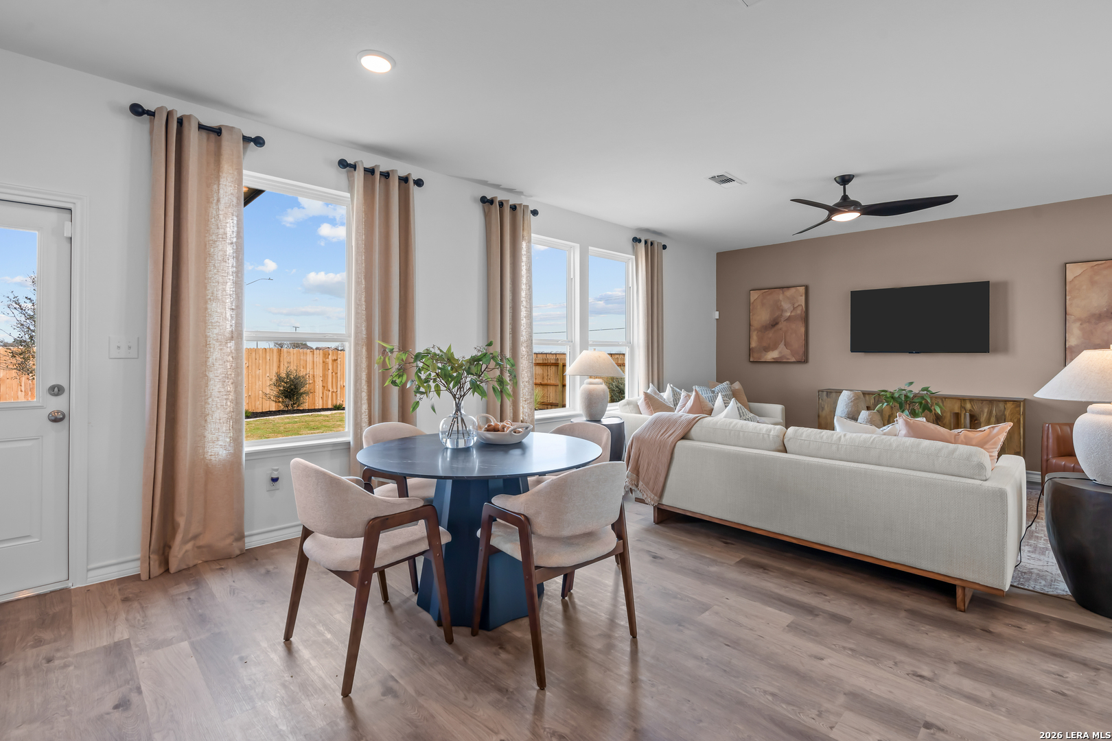 424 Raven Row Marion, TX 78124 - Photo 14 of 30 a living room with furniture a flat screen tv and a large window