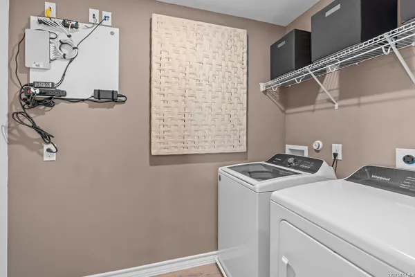 a utility room with dryer and washer