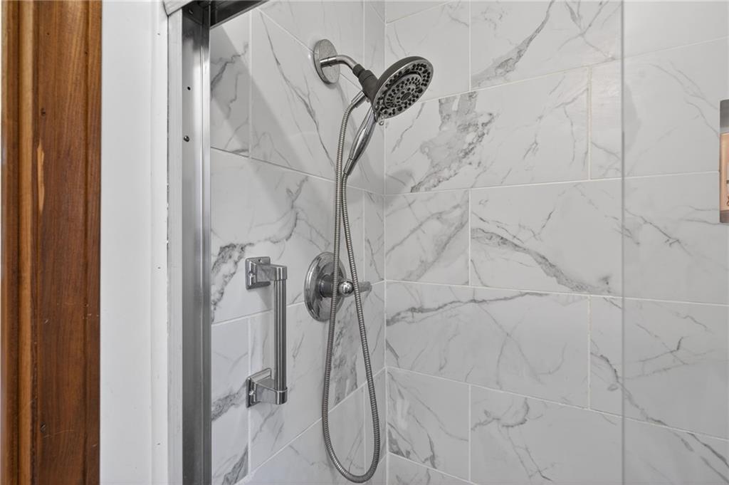 645 Davis Road Hiram, GA 30141 - Photo 22 of 30 a bathroom with a shower