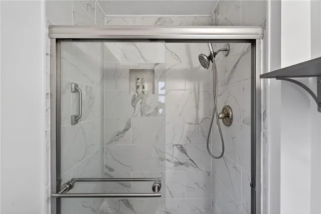 a view of a livingroom with furniture and hardwood floor
