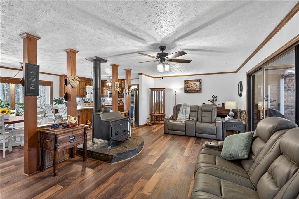 645 Davis Road Hiram, GA 30141 - Photo 9 of 30 a living room with furniture and a chandelier