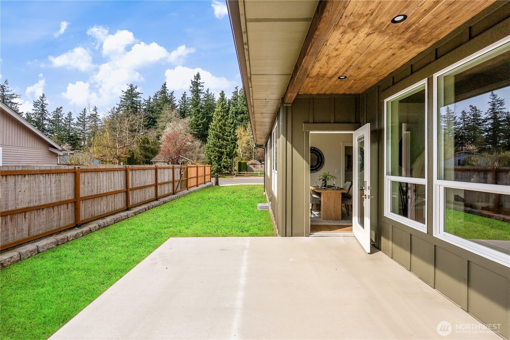 130 Sable Drive Everson, WA 98247 - Photo 17 of 40 a view of a porch with a big yard and large tree