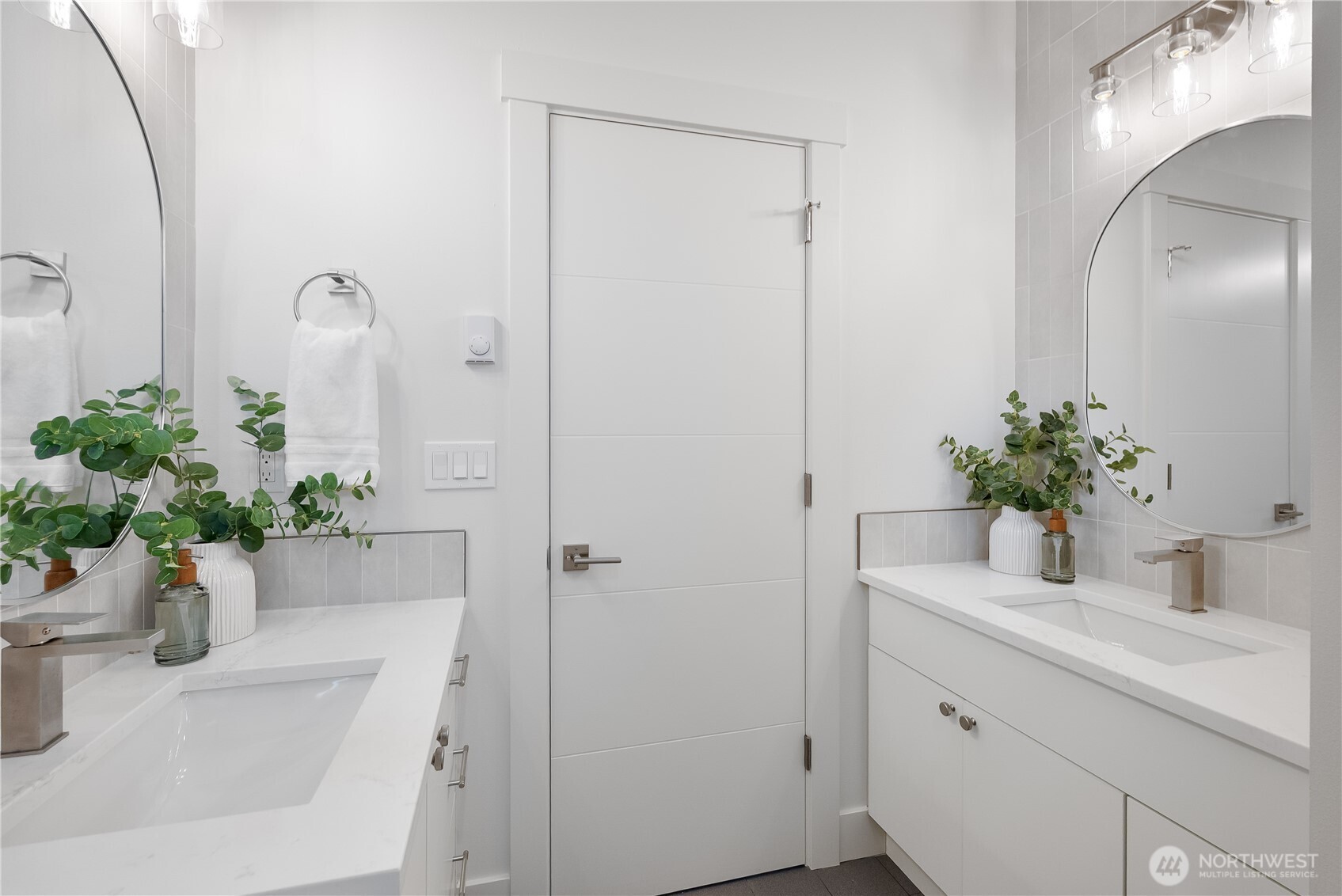 130 Sable Drive Everson, WA 98247 - Photo 29 of 40 a bathroom with a sink a potted plant and a mirror
