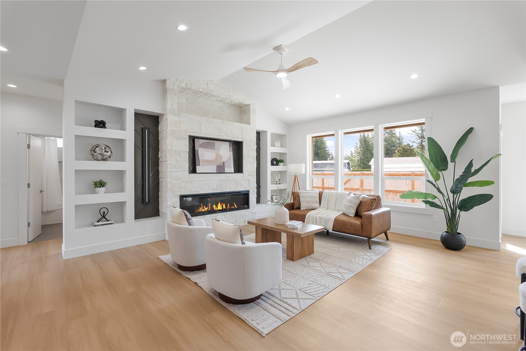 130 Sable Drive Everson, WA 98247 - Photo 5 of 40 a living room with fireplace furniture and a large window