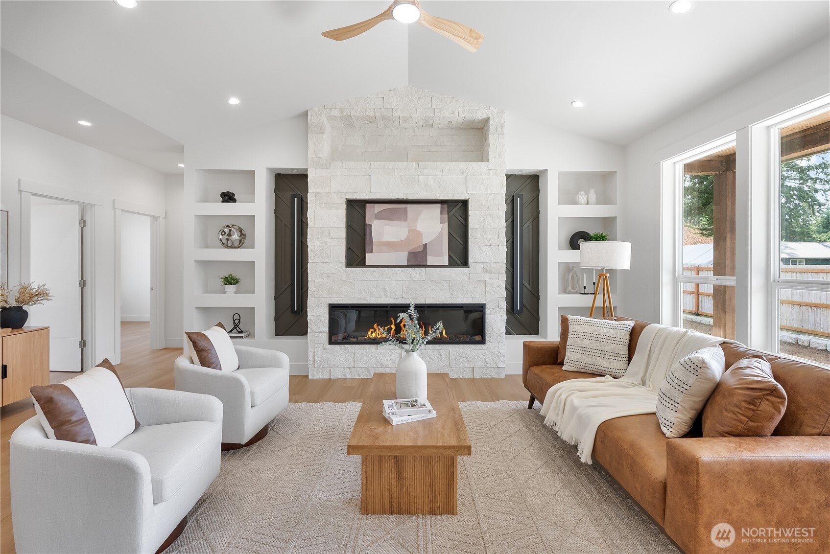 130 Sable Drive Everson, WA 98247 - Photo 6 of 40 a living room with furniture fireplace and a large window