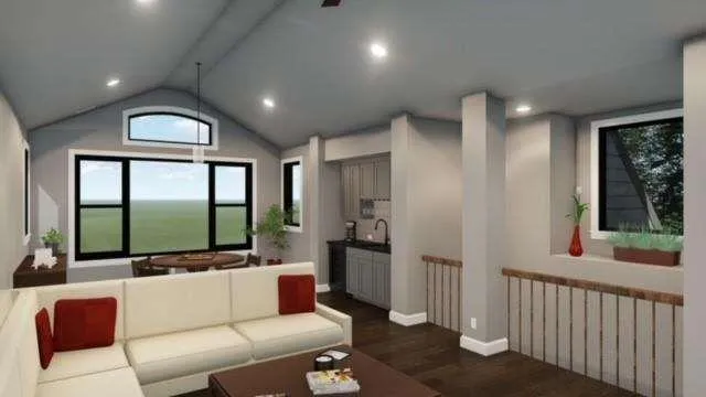 a kitchen with a table chairs refrigerator and microwave