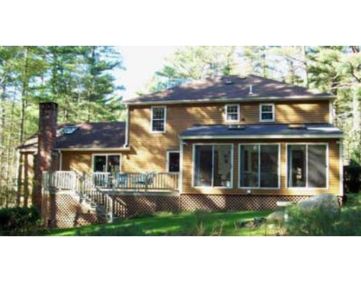 14 Green Needles Road Littleton, MA 01460 - Photo 2 of 2 a view of a house with a yard and plants