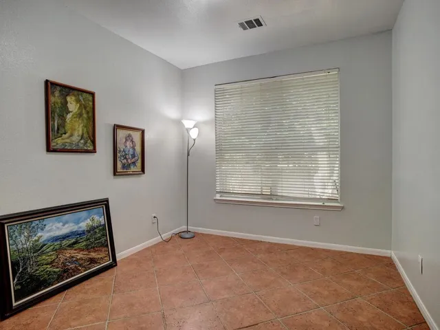 a view of a hallway with closet area