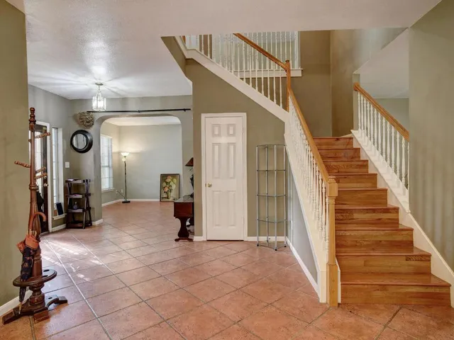 a view of entryway with stairs