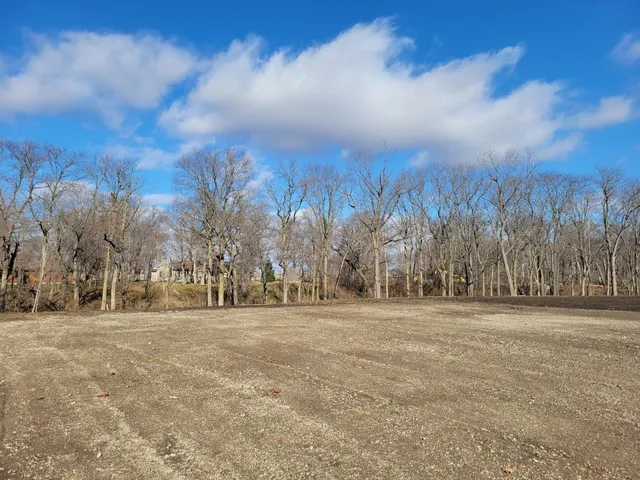 a view of road with trees