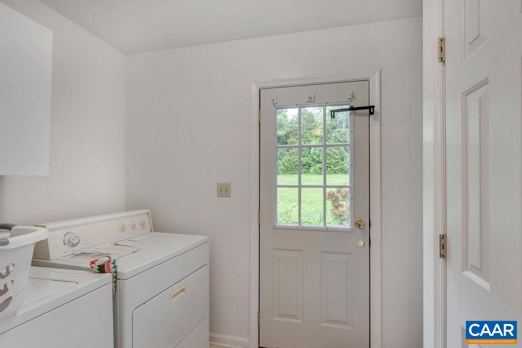 454 Pine Bluff Road Ruckersville, VA 22968 - Photo 19 of 69 a utility room with dryer and washer