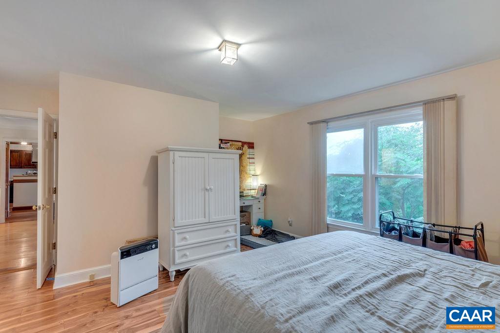 454 Pine Bluff Road Ruckersville, VA 22968 - Photo 22 of 69 a bedroom with a bed and a large window