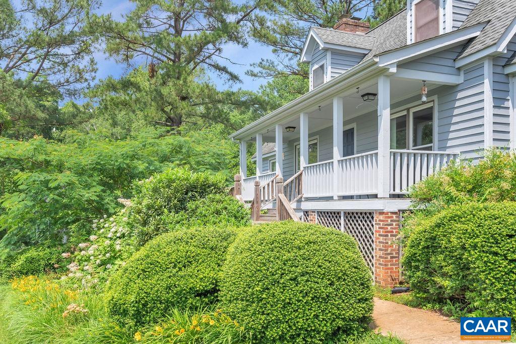 454 Pine Bluff Road Ruckersville, VA 22968 - Photo 42 of 69 a front view of a house with a garden