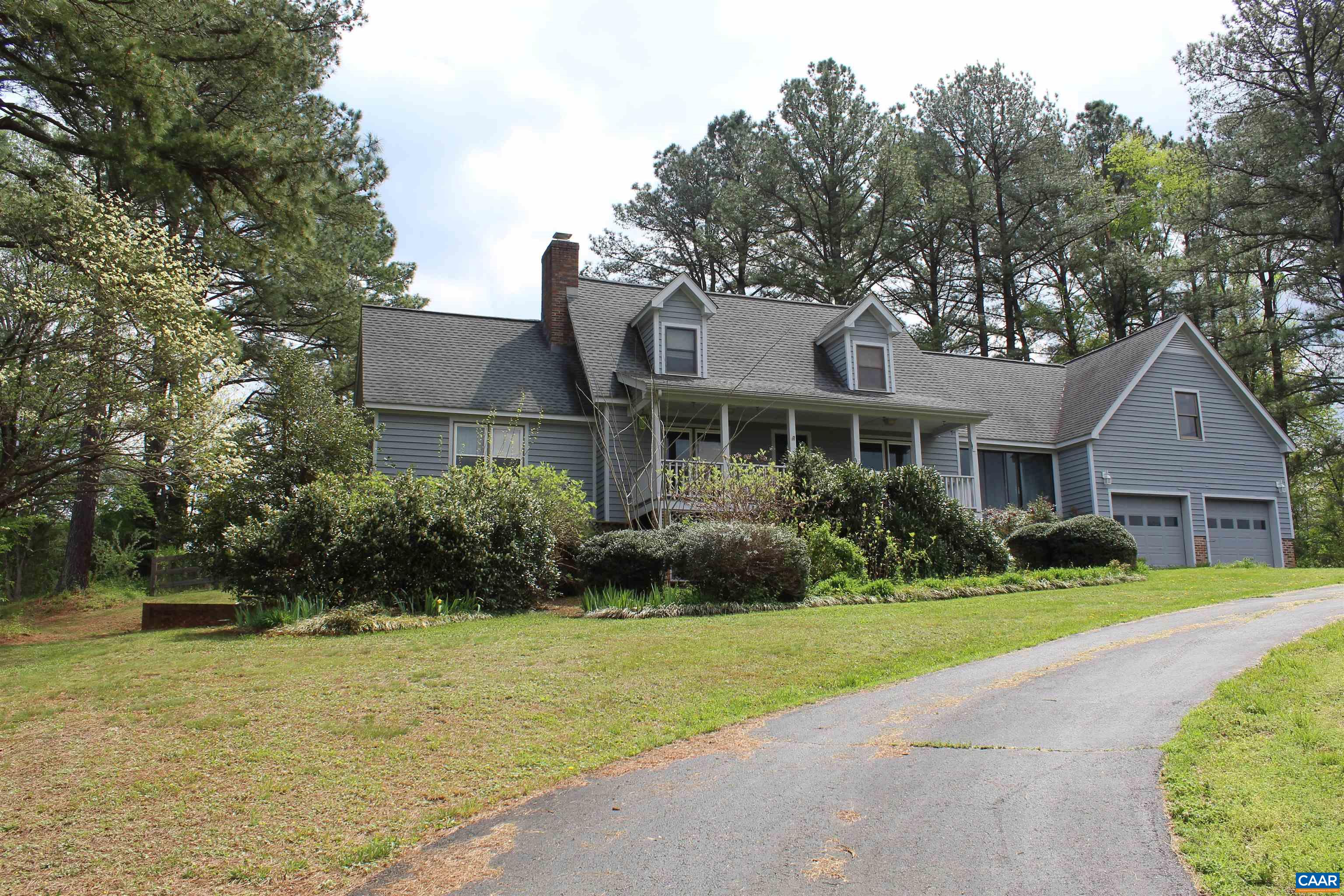 454 Pine Bluff Road Ruckersville, VA 22968 - Photo 48 of 69 a front view of a house with a yard and garage