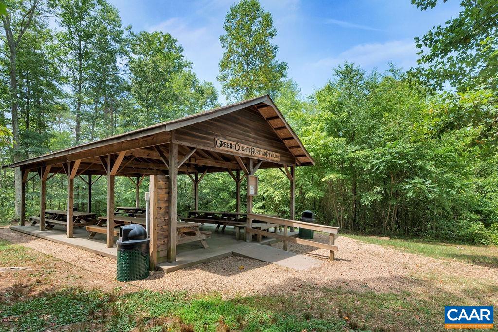 454 Pine Bluff Road Ruckersville, VA 22968 - Photo 63 of 69 a view of backyard with swimming pool and sitting area