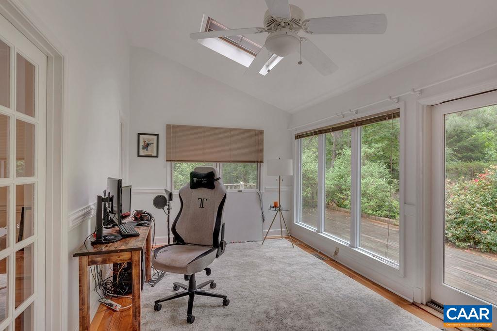 454 Pine Bluff Road Ruckersville, VA 22968 - Photo 10 of 69 a view of a workspace with furniture and a window