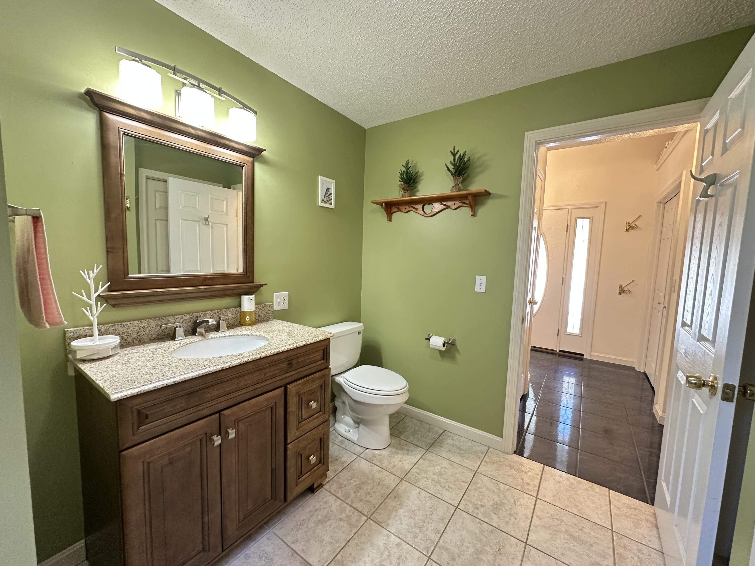 818 Forest Avenue Orono, ME 04473 - Photo 31 of 80 half bath and laundry room